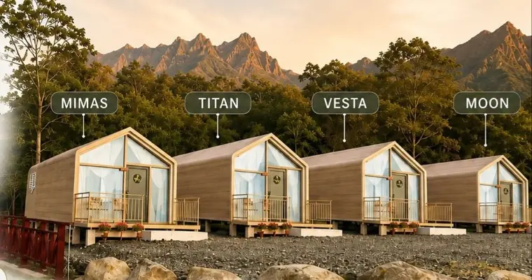 The four Starlight Chalet cabins, Mimas, Titan, Vesta and Moon, in a row below the mountains